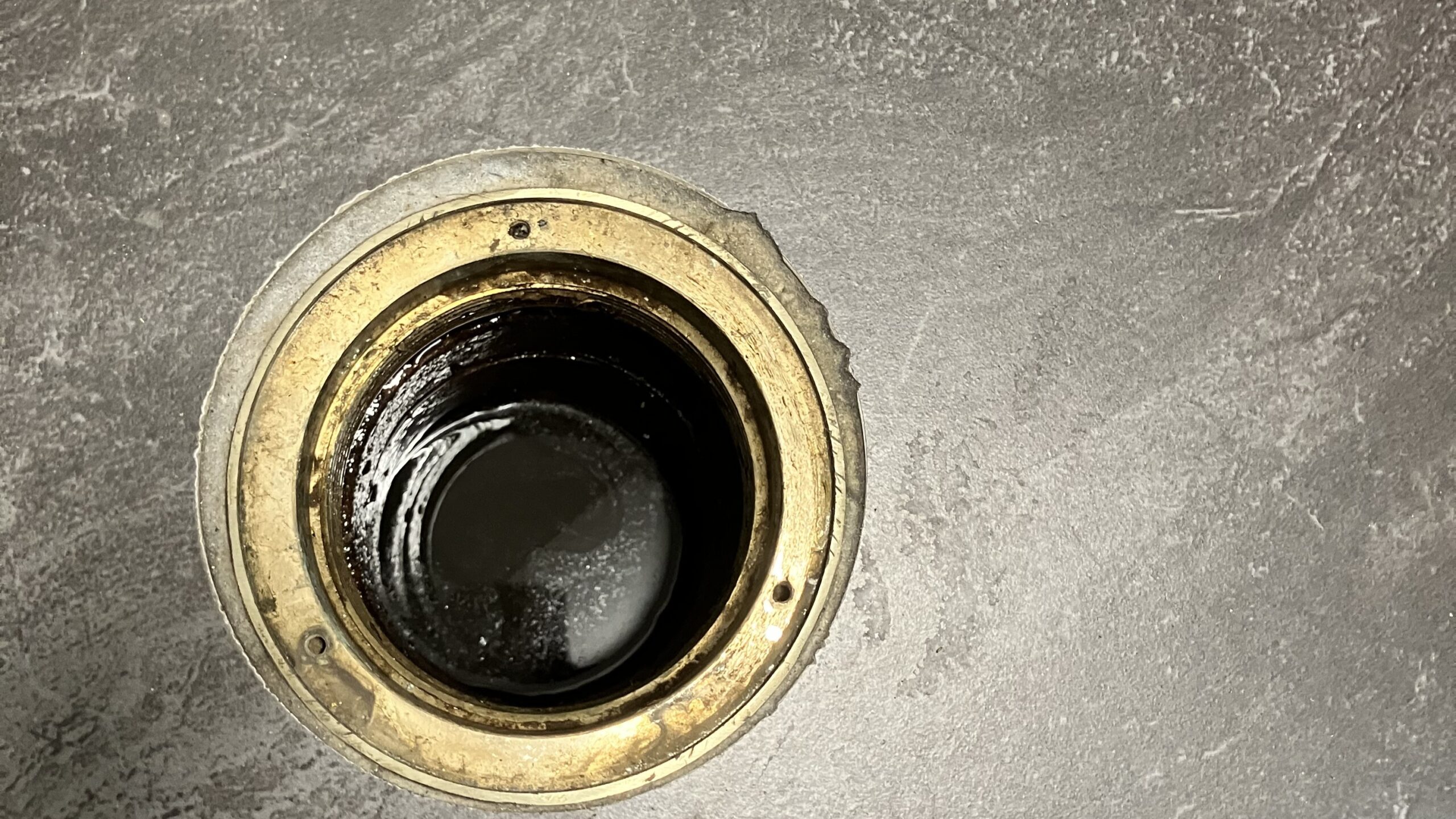 Commercial drain maintenance is important in preventing drain clogs like the one shown