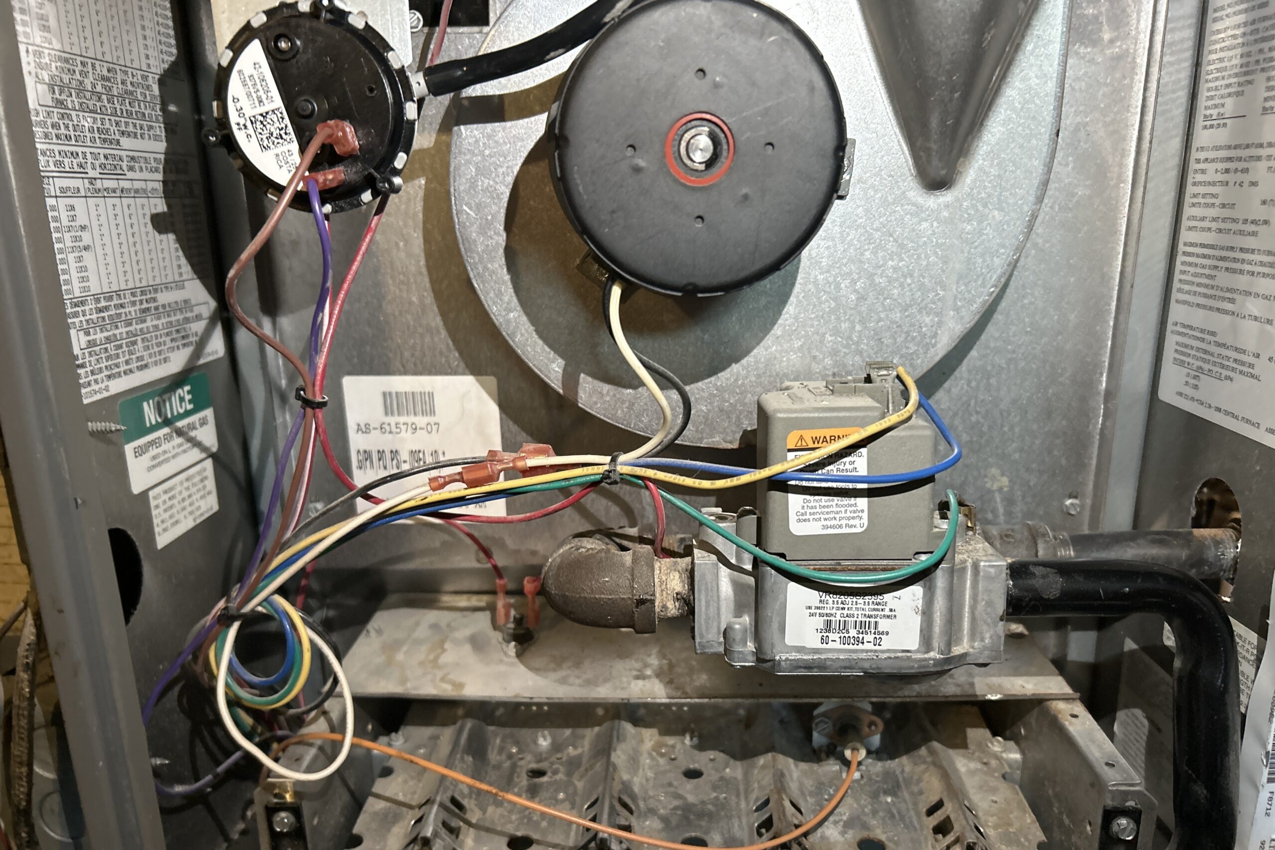 A furnace is shown in close-up. Universe can help with emergency furnace repair warning signs.