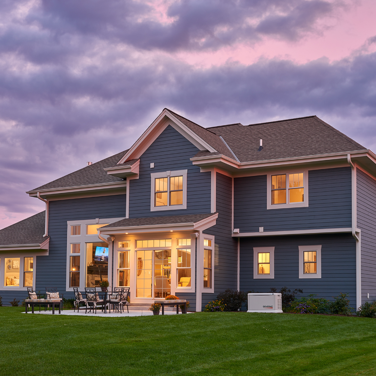 Generator outside well lit home