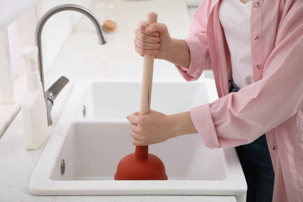 How to Clear a Main Sewer Line Clog Yourself