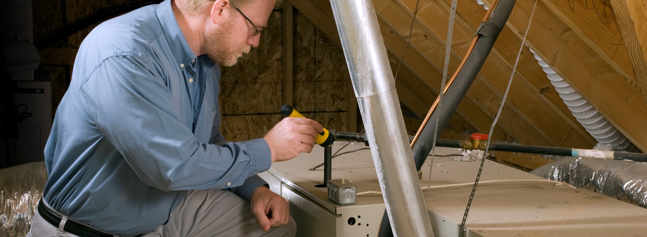 Professional plumber repairing residential water lines