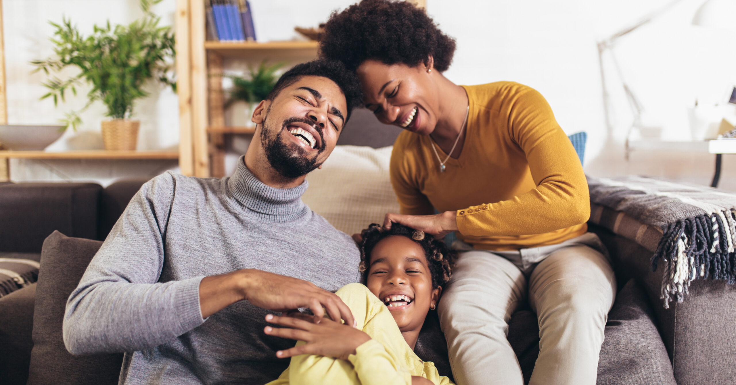 Family happy on the couch