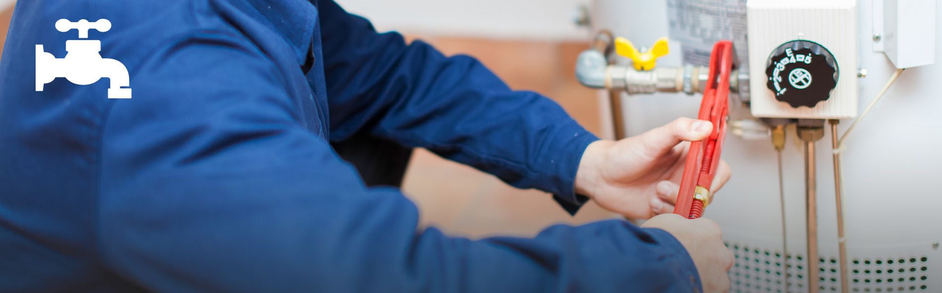 Man adjusting water heater