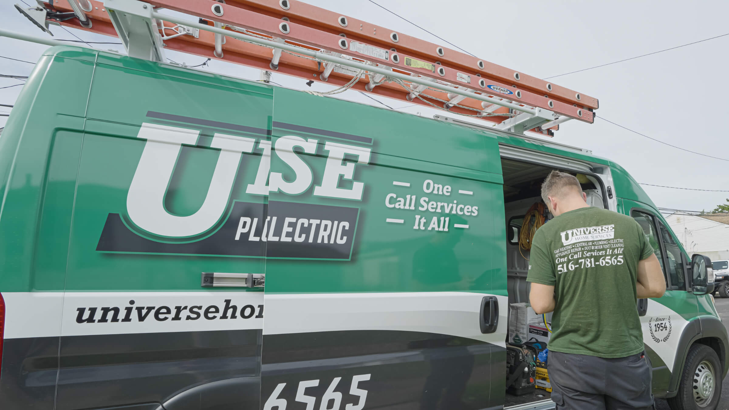 HVAC technician beside open Universe Home Services van